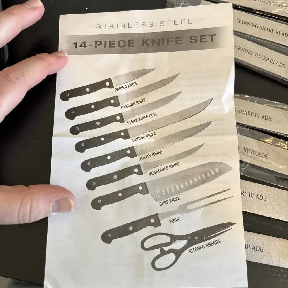 14 Piece serrated stainless steel blades and black handles with triple rivets
